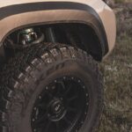 black car wheel and car tire