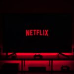 flat screen television displaying Netflix logo