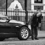 man holding vehicle tire