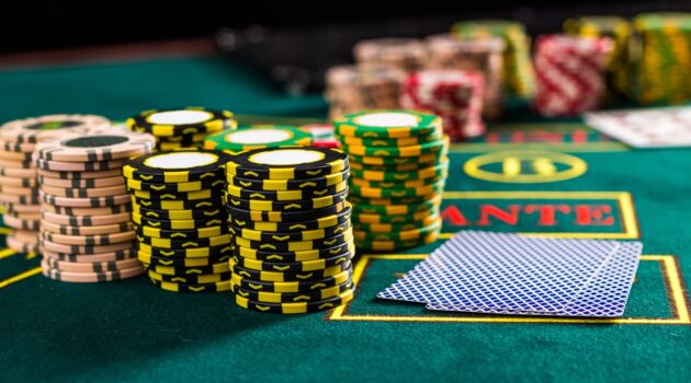 A picture containing gambling house, room, scene, indoor Description automatically generated