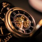 gold and silver round chronograph watch