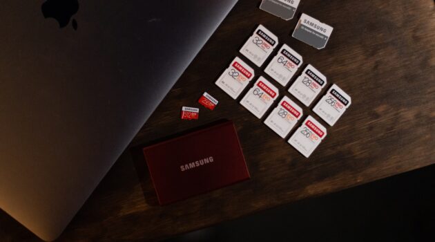 white and red box on brown wooden table
