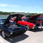 black bmw m 3 coupe parked on parking lot during daytime