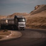 white and black truck on road during daytime