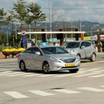 silver mercedes benz coupe on road during daytime